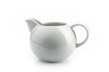 a white creamer on a white background, isolated