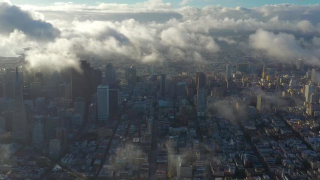 Aerial view of San Francisco cityscape with skyscrapers in beautiful morning mist