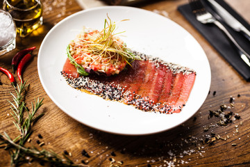 Tuna sashimi served on a plate in restaurant