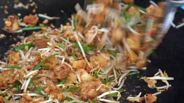 A famous Chinese traditional appetizer in Kota Kinabalu is the &ldquo;Chai Taw Kway&rdquo; or &ldquo;Kuih Lobak Goreng&rdquo; in Malay and Fried Radish Cake in English,street market in Sabah, island Borneo, Malaysia