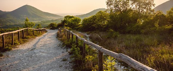 horizontal background path hill at sunset in the Euganean Hlls area Pianoro del Mottolone trail...