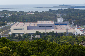 Fototapeta na wymiar Panoramic shot. Territory and industrial buildings of the Far Eastern Military Plant Zvezda
