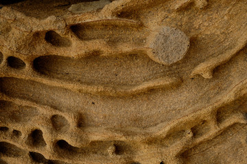 close up limestone texture background, natural surface divided by huge cracks. Background on theme geology