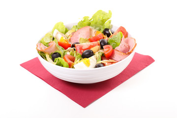 mixed vegetable salad with tomato, ham, egg, olive and lettuce