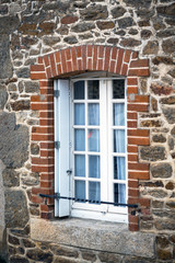 Fototapeta na wymiar The facade of old house