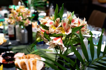 Fototapeta premium bouquet of Orchid flowers on the holiday table.