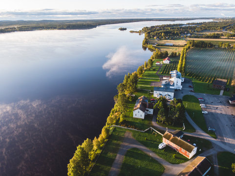 View of Kem River, Kemijoki, in a Liedakkala village in the municipality of Keminmaa in Lapland in north-western Finland, Aerial summer dawn sunrise