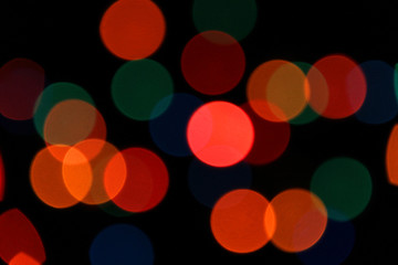 Colored lights spots on a black background