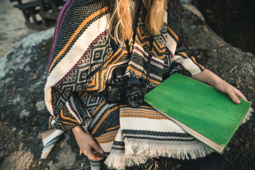 Poncho and book