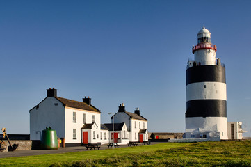 Fototapeta na wymiar Lighthouse at the end of the Atlantic Ocean world.