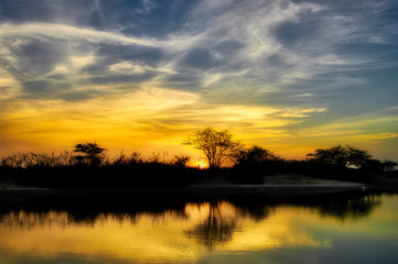 Sunset in Senegal lake. Africa.