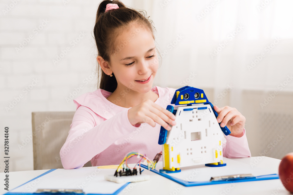 Poster modern technologies. little technician constructing electric robot