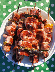 Mixed meat skewers cooked on a barbecue