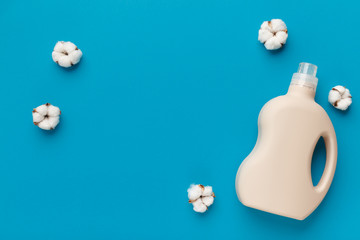 Bio plastic bottle of liquid laundry detergent on blue