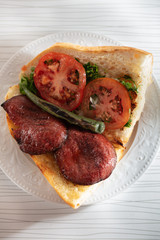 fresh turkish sausage in bread with tomato