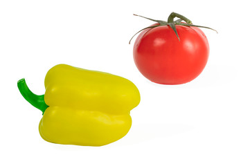 sweet yellow pepper and red tomato isolated on a white background