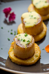 Scallops. Sea Scallops seared in brown butter sauce and garnished with a lemon sauce. 