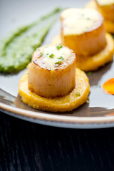 Scallops. Sea Scallops seared in brown butter sauce and garnished with a lemon sauce. 