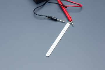 Analog needle tester