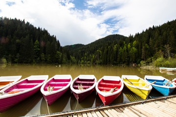 Boat dock waiting for tourists to walk on the lake.