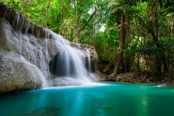 Fototapeta premium Beauty in nature, Huay Mae Khamin waterfall in tropical forest of national park, Kanchanaburi, Thailand 