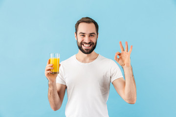 Handsome young bearded man wearing t-shirt standing