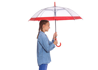 Portrait of teen girl holding umbrella - side view, isolated on white background. Happy child with umbrella for autumn rainy day. Cute caucasian young teenager smiling and looking away - profile.