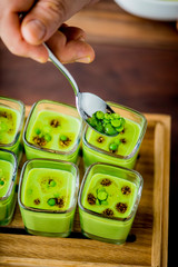 Wheat grass shots. Wheat grass, kale, celery, ginger, micro greens, cucumber blended together and served in shot glasses. 