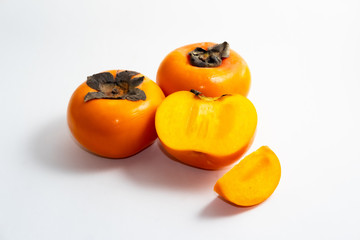persimmons isolated on white background