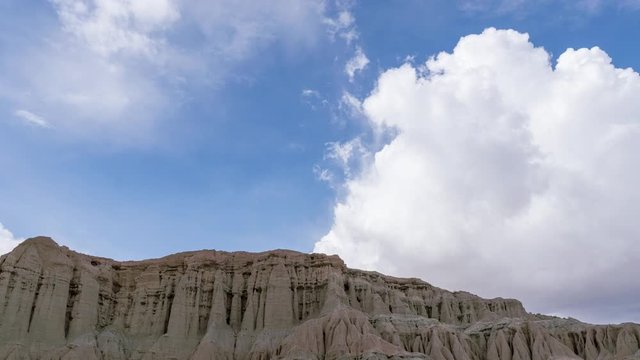 Time Lapse Mountain Illuminated by the Sun Passing Through the Clouds