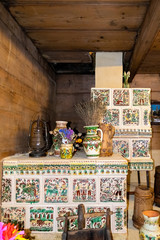 Bukovel, Ivano-Frankivsk region / Ukraine - Fabruary 23 2020: Ancient interior of a rural house in an ethnographic park in the ski resort of Bukovel in the Carpathian mountains in Ukraine. Old stove