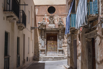 Narrow street in historic part of Trapani city, Sicily Island in Italy