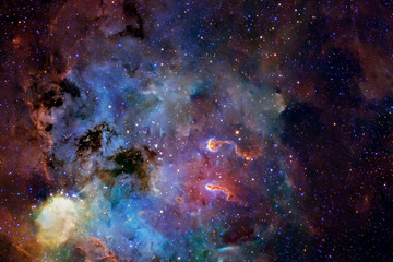 A beautiful nebula of different colors, with stars and galaxies. Elements of this image were furnished by NASA. - Powered by Adobe