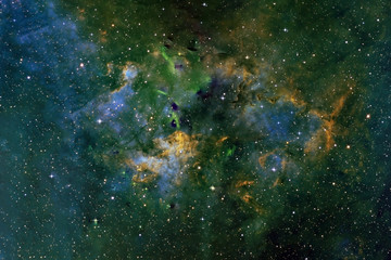 Beautiful space, in different colors, with nebulae and stars. Elements of this image were furnished by NASA.