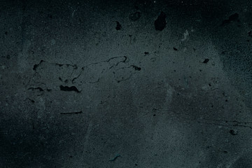 old dark gray wall background or texture