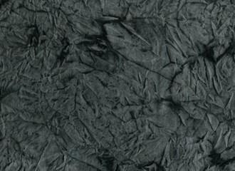 dark black abstract fabric background, hand dyeing folds and spots, illustration for design