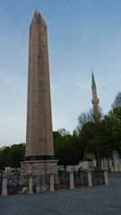 Obraz premium Theodosius ancient egyptian obelisk dated 1400 B.C. with hieroglyphics, re-erected at Constantinopolis in the 4th century A.D., historic part of Istanbul downtown, Turkey