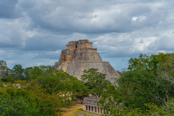 Fototapeta na wymiar The Adivino (the Pyramid of the Magician or the Pyramid of the Dwarf). Uxmal an ancient Maya city of the classical period. Travel photo. Yucatan. Mexico.