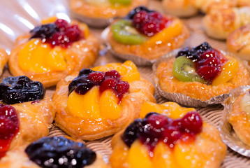 Honey Arabic Fruit Cake. Honey cake. Home made cake with beautiful fresh fruit decoration. Celebrating happy birthday.