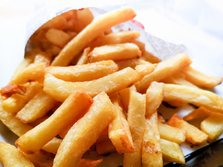 Golden French fries potatoes ready to be eaten