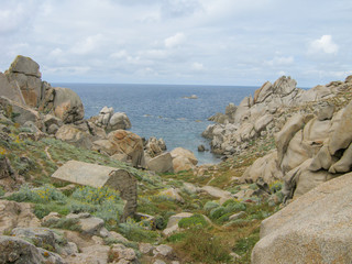 splendid panorama from the valley of the moon in sardinia with its granite rocks and the turquoise sea in the background