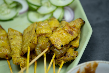 Pork satay with Thai spices and peanut sauce.