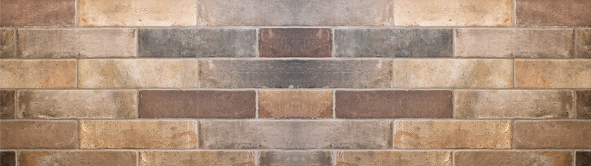 Brown gray natural stone tiles masonry wall texture background banner