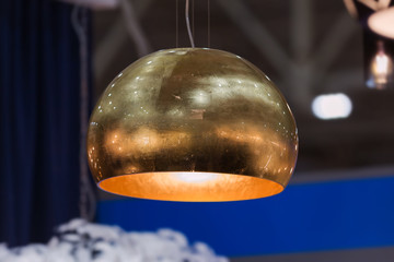 Modern streamlined copper chandelier. Bubble metal gold brass shade pendant