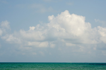 White clouds with blurred sky and sea with blurred pattern background