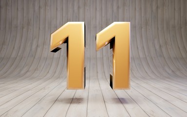 Golden number 11 on wooden floor.