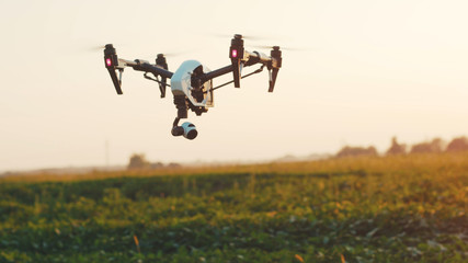 Close up smart agriculture drone flying in sky rural aerial helicopter agros copter farm farming...