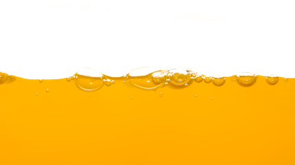 Orange water surface with bubble and water splash on white background