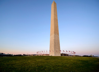 Sunset captured behind the circle of flags at the Washington Monument