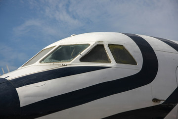 Fototapeta na wymiar Airplane with white and black. Front window